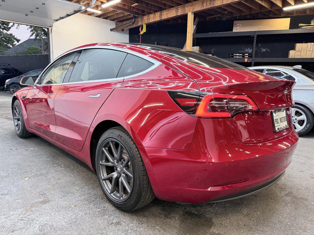 used 2018 Tesla Model 3 car, priced at $15,500