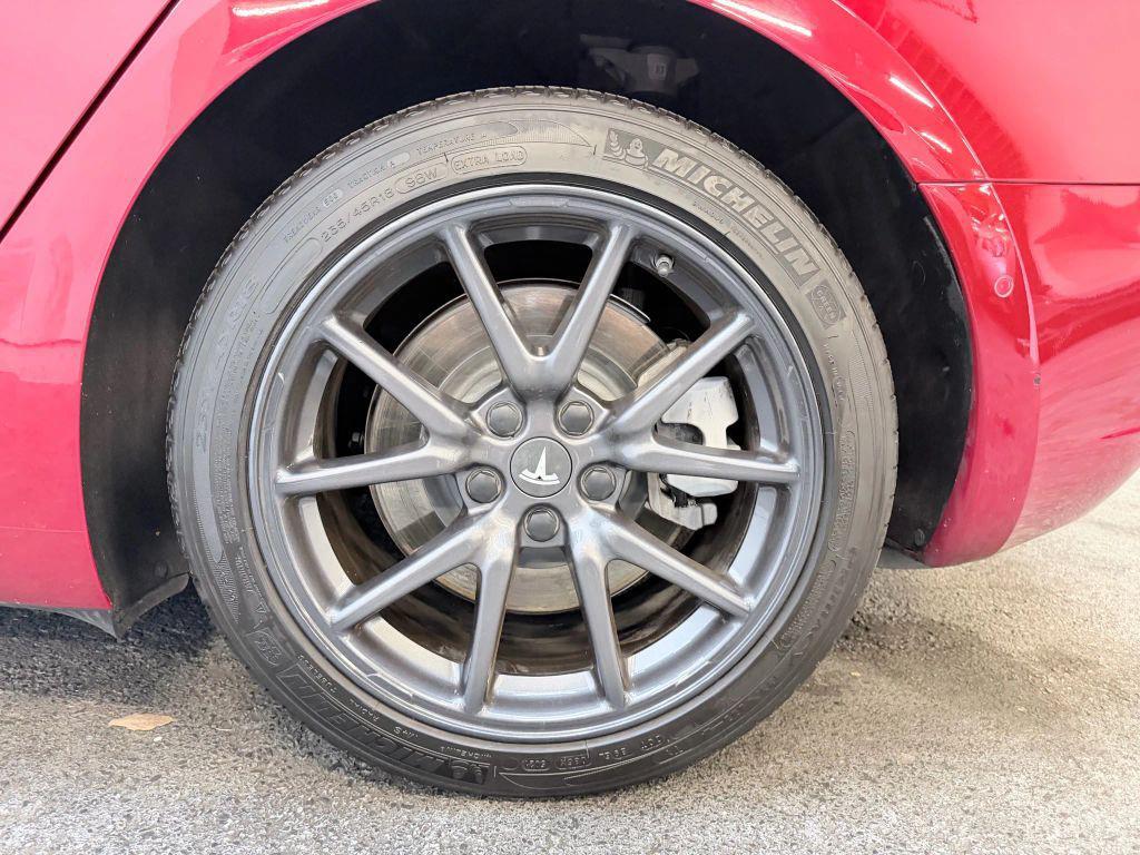 used 2018 Tesla Model 3 car, priced at $15,500