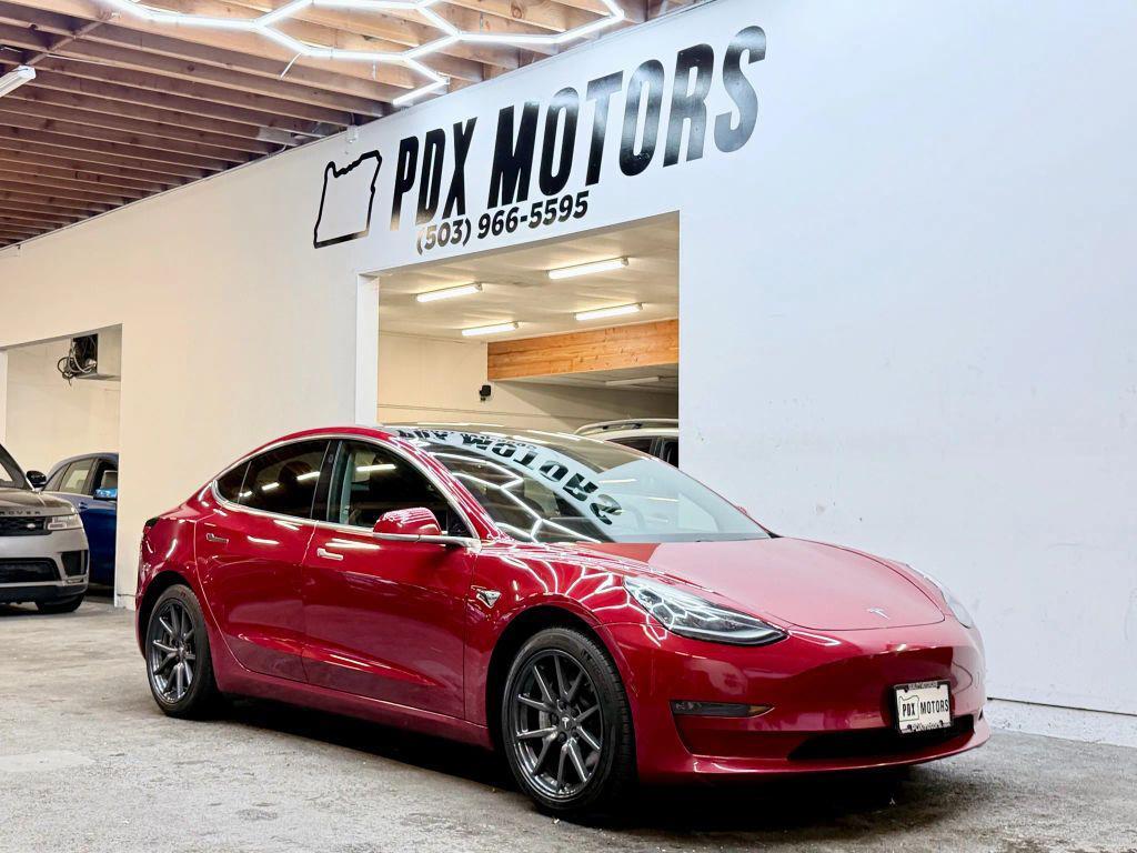 used 2018 Tesla Model 3 car, priced at $15,500
