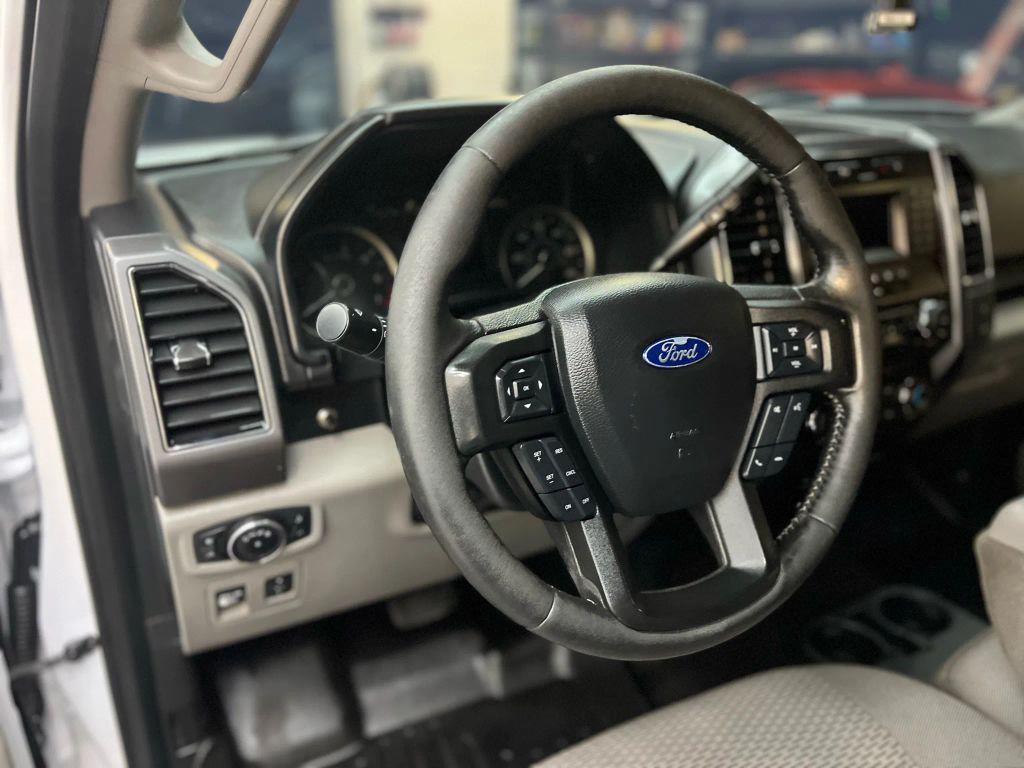 used 2018 Ford F-150 car, priced at $15,900