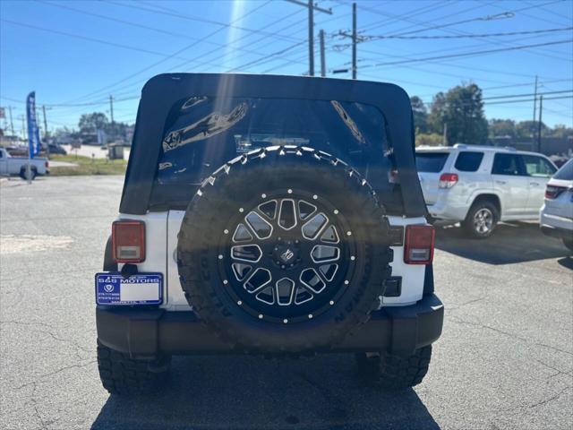 used 2015 Jeep Wrangler Unlimited car, priced at $16,950