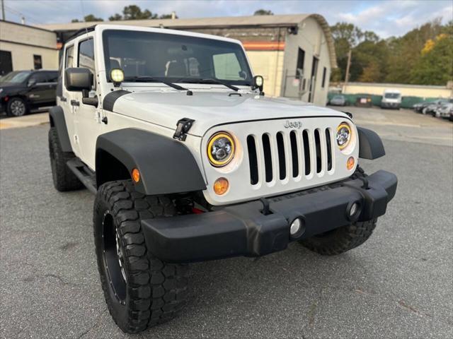 used 2015 Jeep Wrangler Unlimited car, priced at $16,950