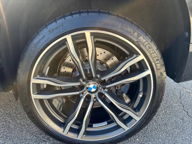 used 2019 BMW X6 M car, priced at $44,850