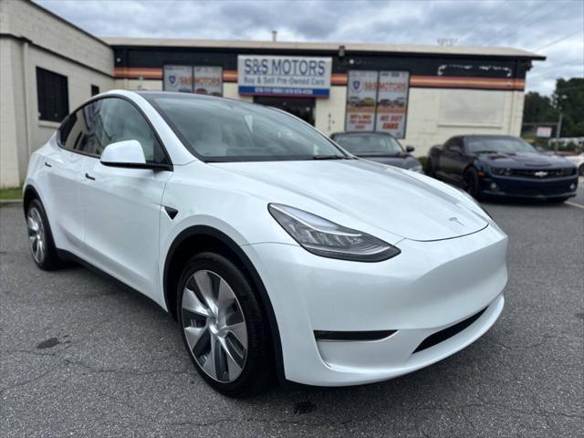 used 2023 Tesla Model Y car, priced at $35,995