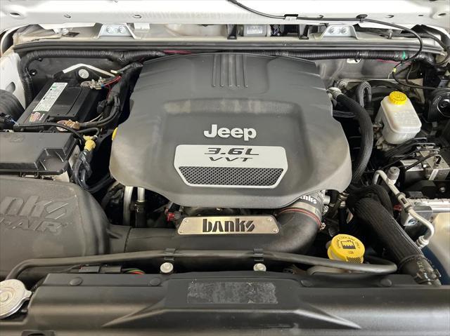 used 2013 Jeep Wrangler Unlimited car, priced at $20,999