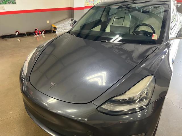 used 2018 Tesla Model 3 car, priced at $15,999