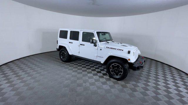 used 2016 Jeep Wrangler Unlimited car, priced at $19,671