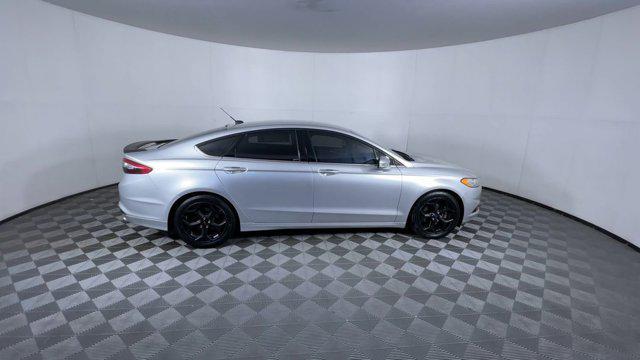 used 2015 Ford Fusion car, priced at $6,900