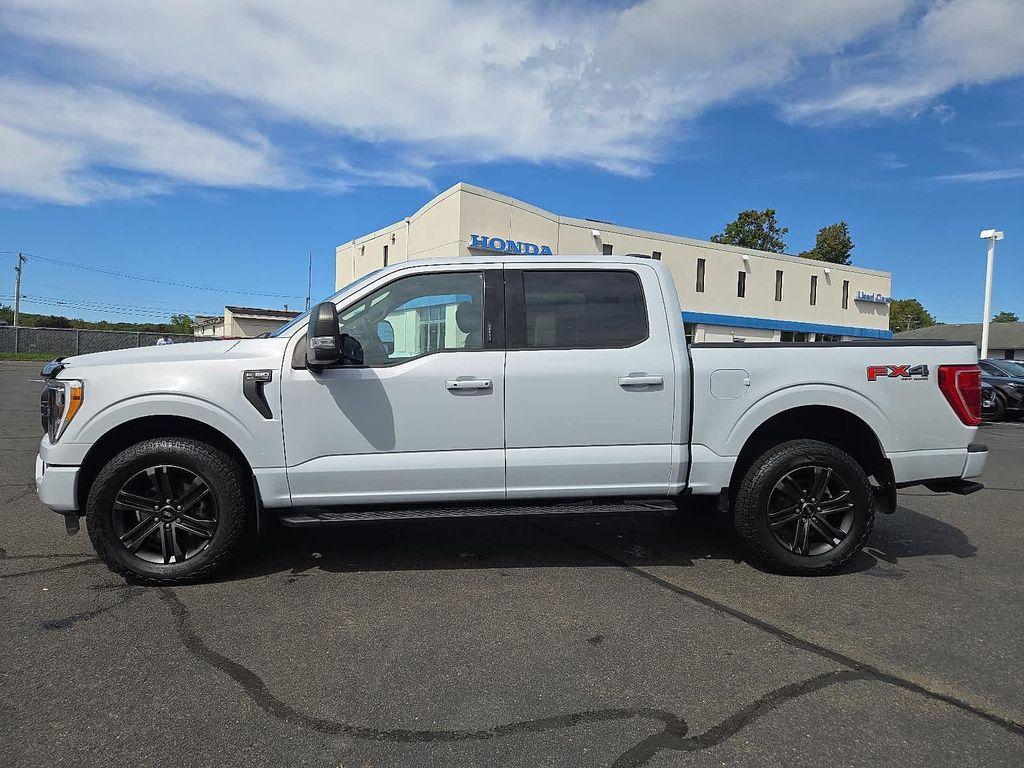 used 2021 Ford F-150 car, priced at $37,648
