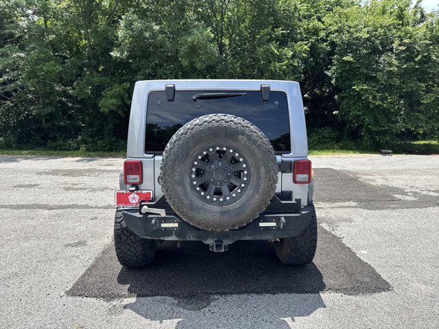 used 2013 Jeep Wrangler Unlimited car, priced at $18,888
