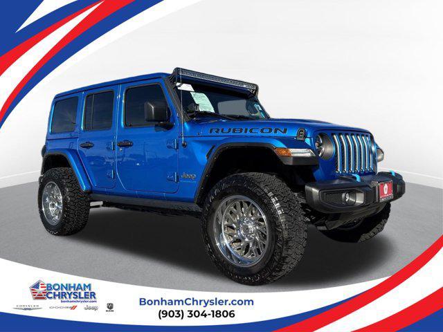 used 2023 Jeep Wrangler 4xe car, priced at $38,996