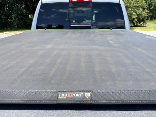 used 2018 Ram 1500 car, priced at $23,999