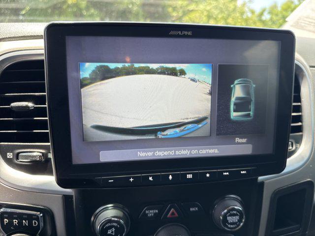 used 2018 Ram 1500 car, priced at $23,999