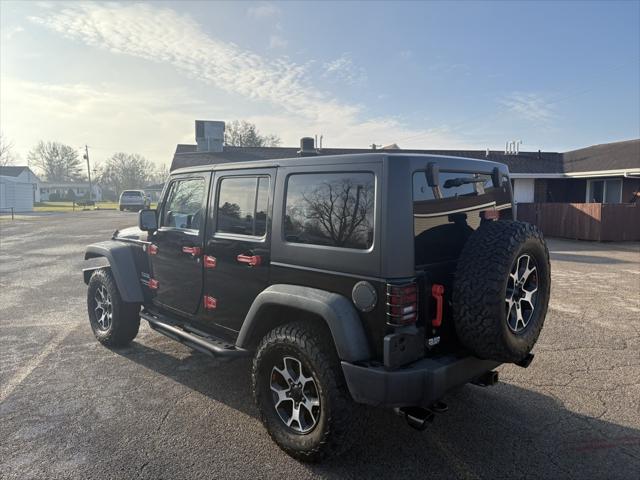 used 2014 Jeep Wrangler Unlimited car, priced at $14,500