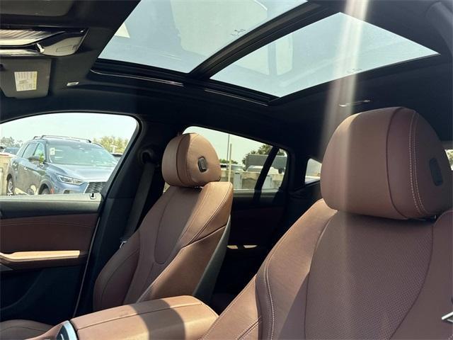 used 2022 BMW X6 car, priced at $52,987