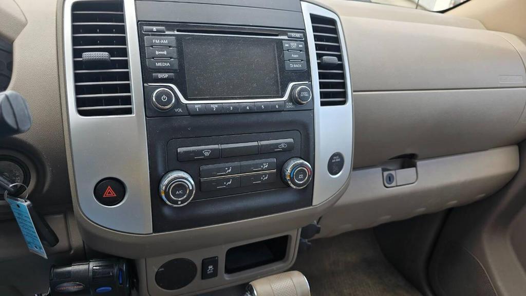 used 2015 Nissan Frontier car, priced at $13,850