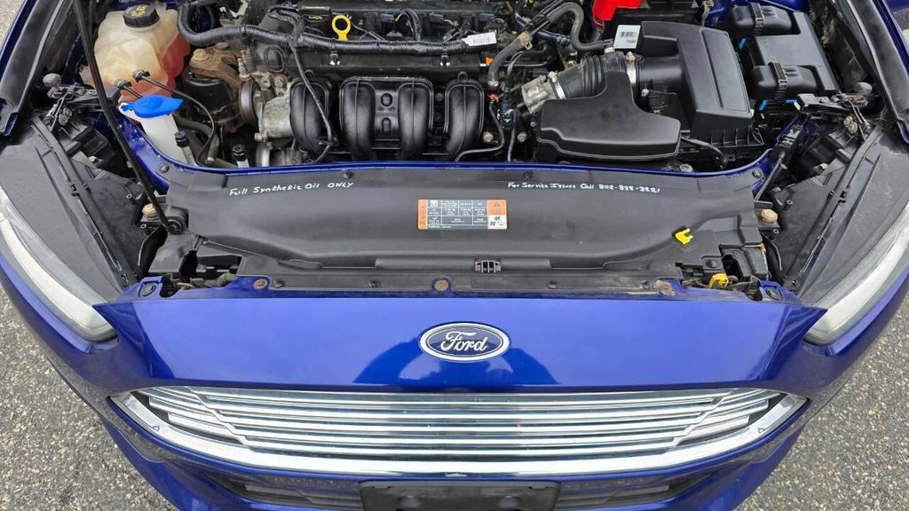 used 2015 Ford Fusion car, priced at $10,950