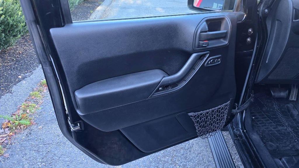 used 2015 Jeep Wrangler car, priced at $15,950