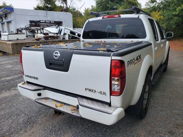 used 2011 Nissan Frontier car, priced at $15,300