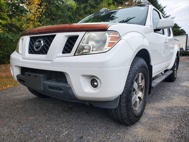 used 2011 Nissan Frontier car, priced at $15,300