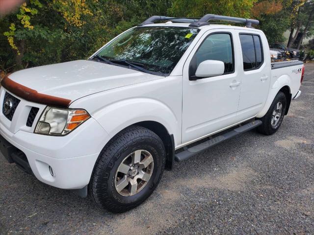 used 2011 Nissan Frontier car, priced at $15,300