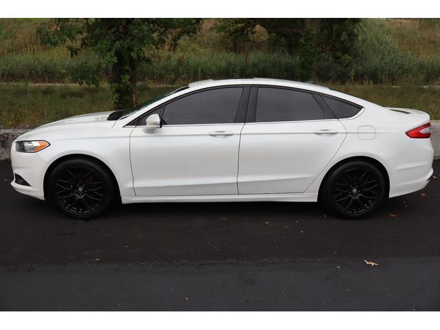 used 2016 Ford Fusion car, priced at $6,999