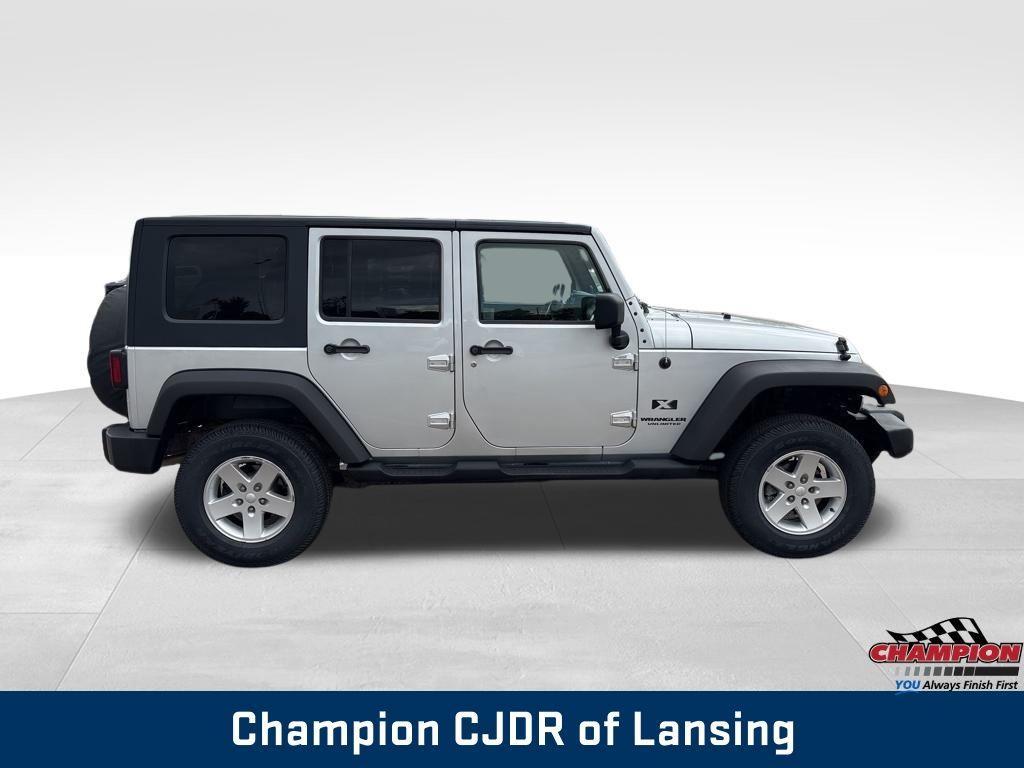 used 2009 Jeep Wrangler Unlimited car, priced at $13,324