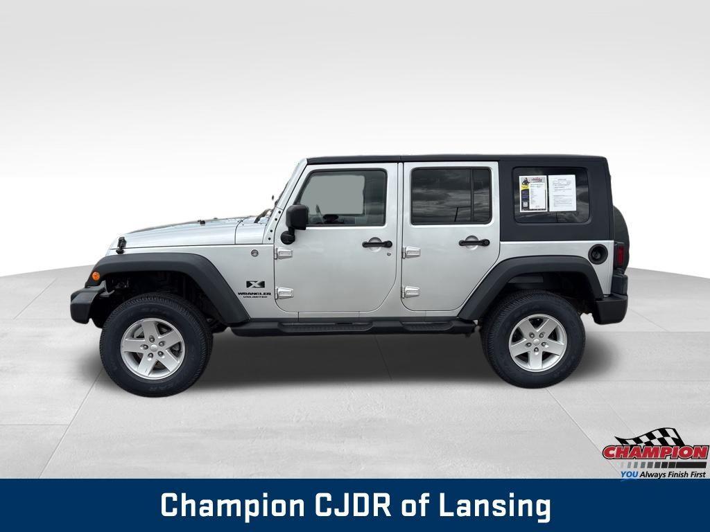 used 2009 Jeep Wrangler Unlimited car, priced at $13,324