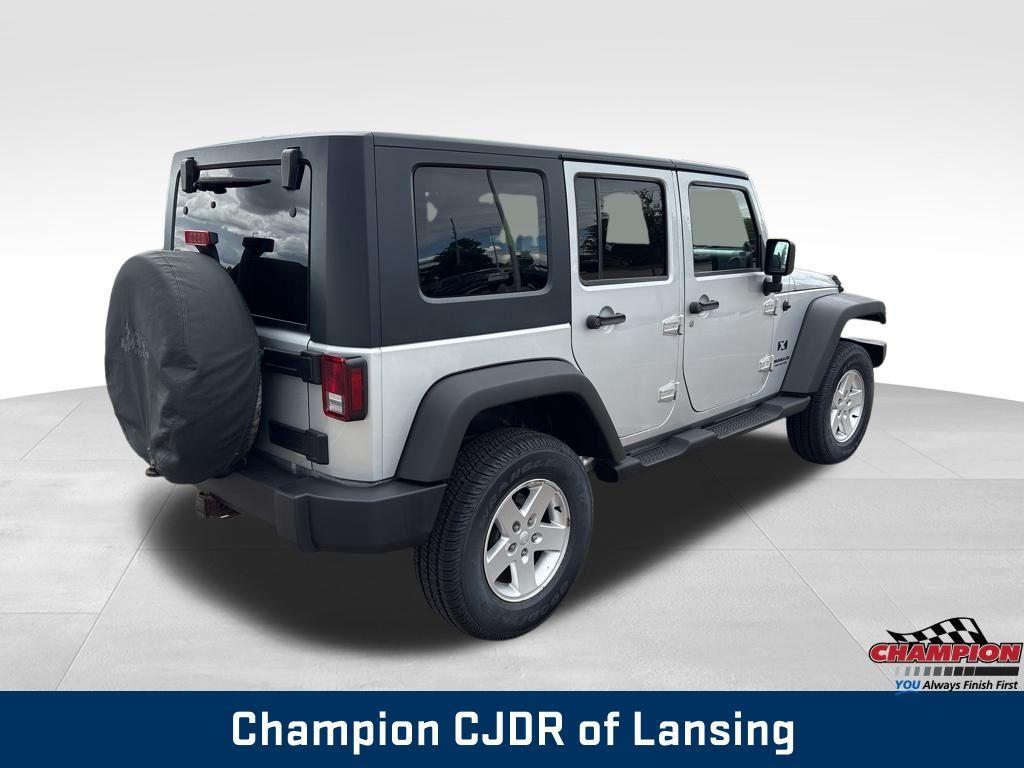 used 2009 Jeep Wrangler Unlimited car, priced at $13,324