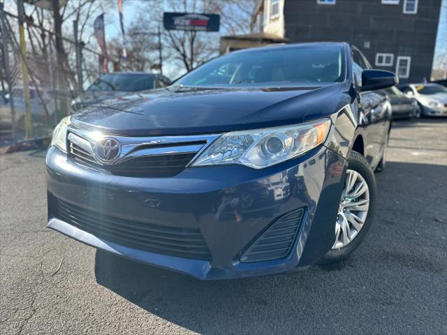 used 2014 Toyota Camry car, priced at $8,999