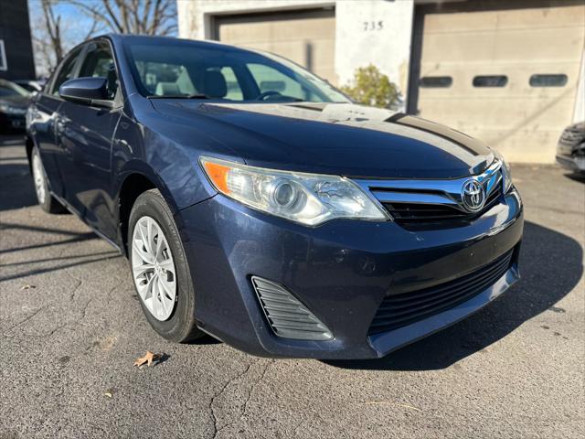 used 2014 Toyota Camry car, priced at $8,999