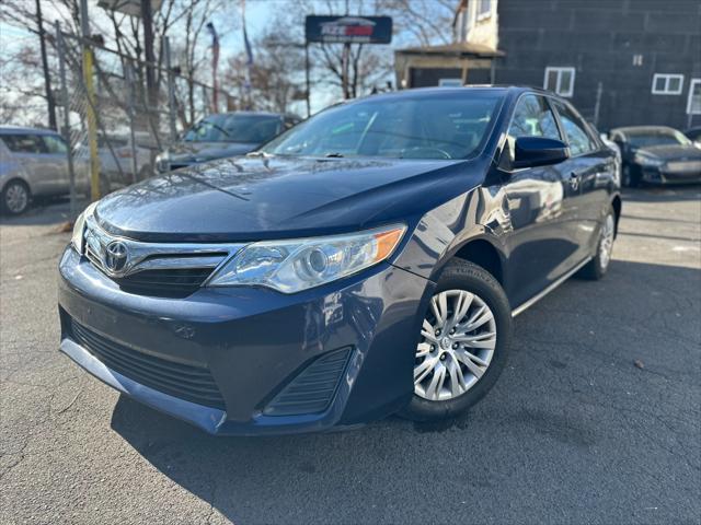 used 2014 Toyota Camry car, priced at $8,999