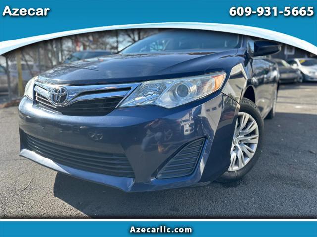 used 2014 Toyota Camry car, priced at $8,999