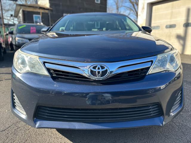 used 2014 Toyota Camry car, priced at $8,999