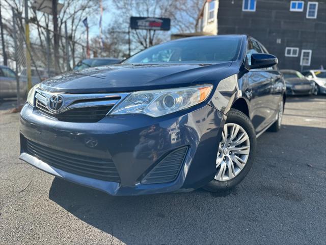 used 2014 Toyota Camry car, priced at $8,999