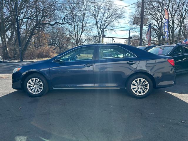 used 2014 Toyota Camry car, priced at $8,999