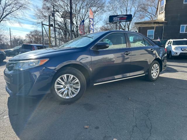 used 2014 Toyota Camry car, priced at $8,999