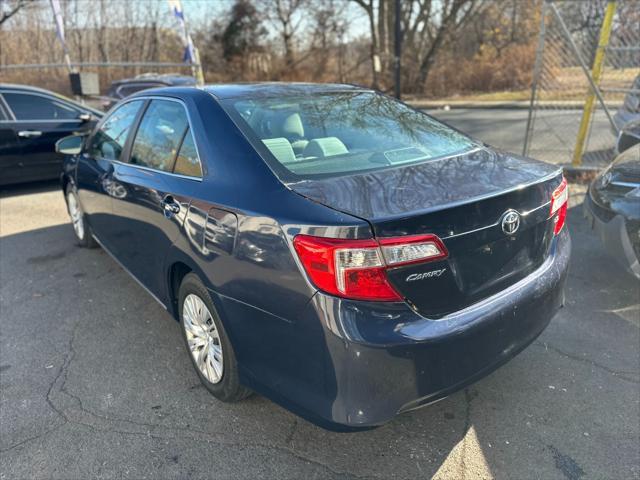 used 2014 Toyota Camry car, priced at $8,999