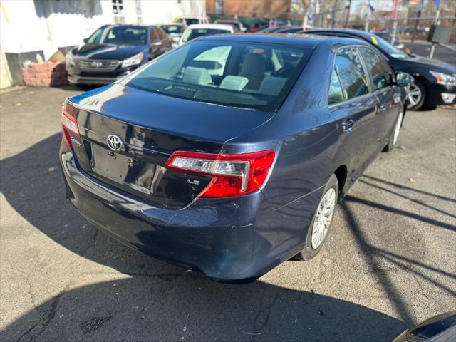 used 2014 Toyota Camry car, priced at $8,999