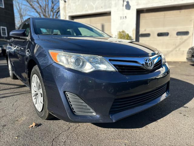 used 2014 Toyota Camry car, priced at $8,999