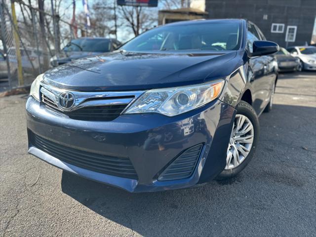 used 2014 Toyota Camry car, priced at $8,999