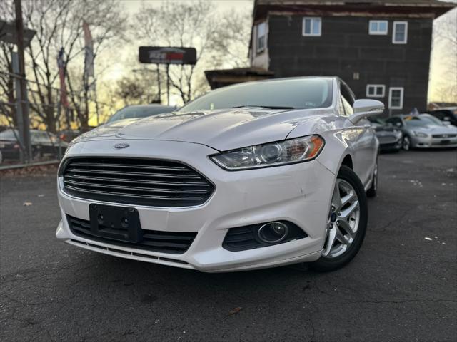 used 2014 Ford Fusion car, priced at $6,999