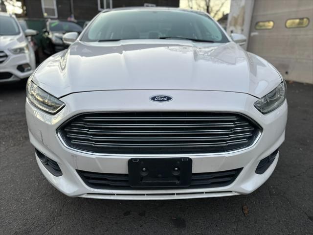 used 2014 Ford Fusion car, priced at $6,999