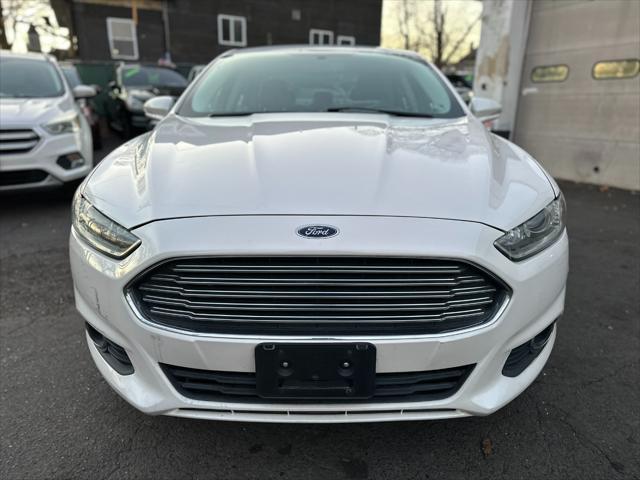 used 2014 Ford Fusion car, priced at $6,999