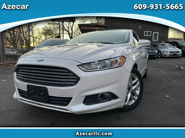 used 2014 Ford Fusion car, priced at $6,999