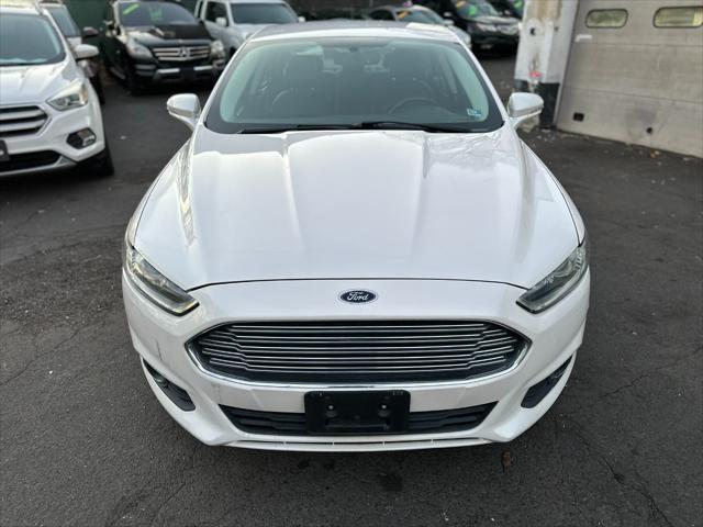 used 2014 Ford Fusion car, priced at $6,999