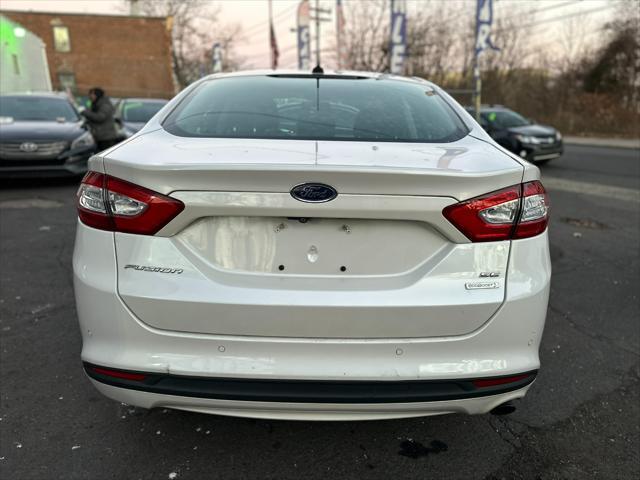 used 2014 Ford Fusion car, priced at $6,999