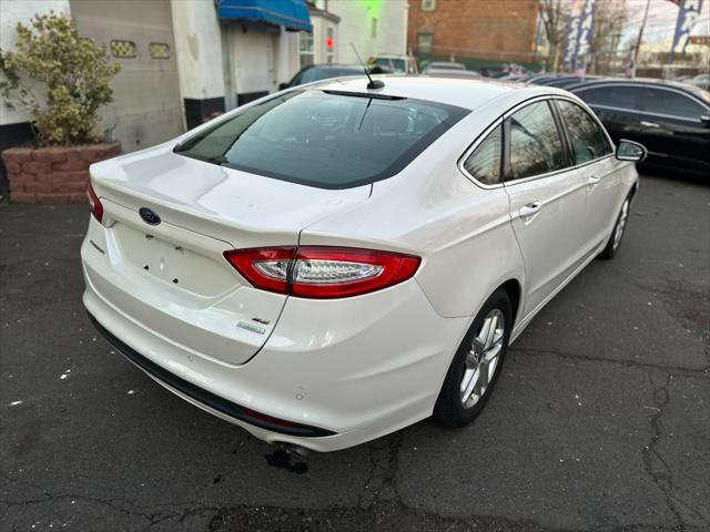 used 2014 Ford Fusion car, priced at $6,999