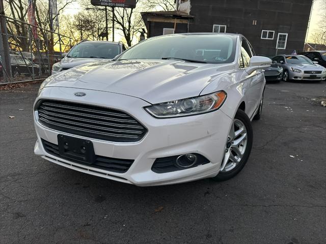 used 2014 Ford Fusion car, priced at $6,999