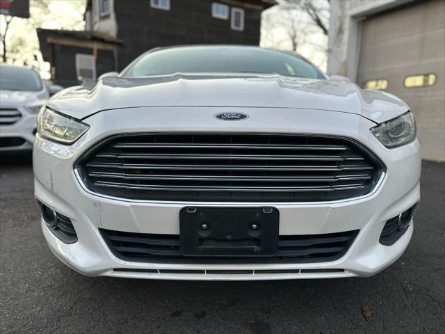 used 2014 Ford Fusion car, priced at $6,999